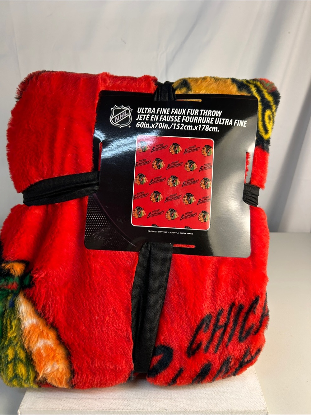 NHL Chicago Blackhawks Red and Yellow Faux Fur Throw